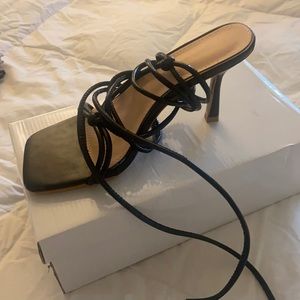 Black straps heel